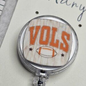 Badge reel with a handmade charm accessory